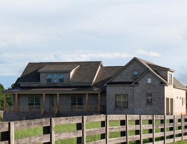 4003 Kelley Farris Rd, Columbia, TN 38401 - view of front facade with a standing seam roof, metal roof, and a porch