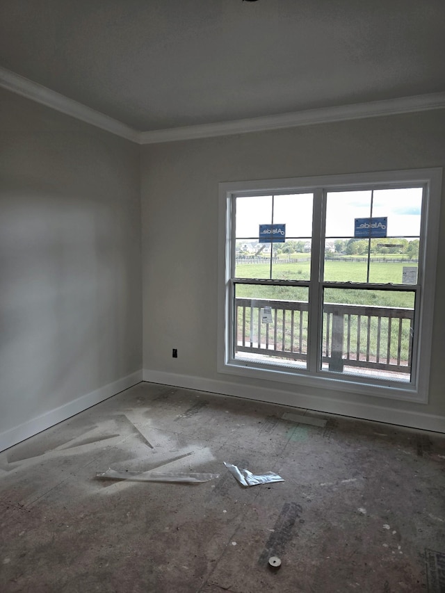 4003 Kelley Farris Rd, Columbia, TN 38401 - spare room featuring crown molding and baseboards