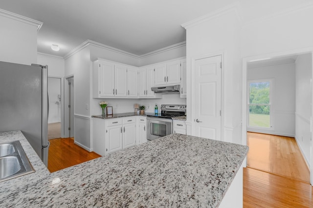 8560 Coopertown Rd, Joelton, TN 37080 - kitchen featuring stainless steel appliances, under cabinet range hood, light wood-style floors, white cabinets, and crown molding