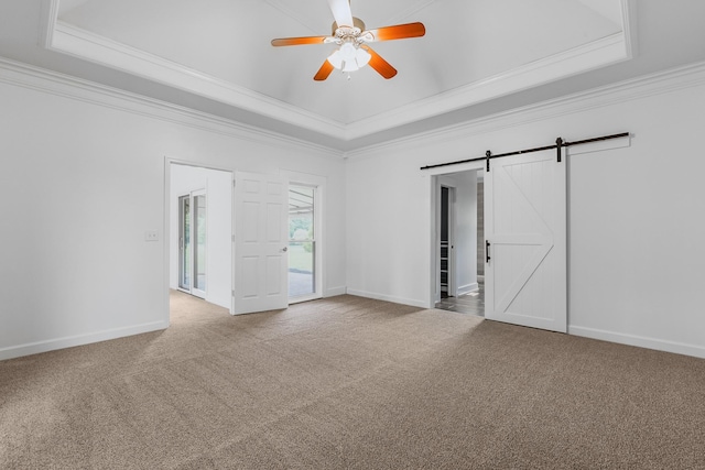 8560 Coopertown Rd, Joelton, TN 37080 - unfurnished room with a raised ceiling, ornamental molding, carpet, a barn door, and a ceiling fan