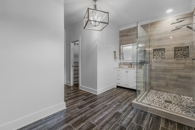 8560 Coopertown Rd, Joelton, TN 37080 - bathroom with vanity, a shower stall, baseboards, wood finish floors, and recessed lighting