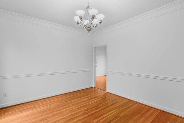 8560 Coopertown Rd, Joelton, TN 37080 - unfurnished room featuring a chandelier, light wood-type flooring, baseboards, and crown molding