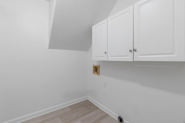 8560 Coopertown Rd, Joelton, TN 37080 - washroom with cabinet space, light wood-style flooring, hookup for a washing machine, and baseboards