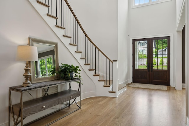 8118 Heirloom Blvd, College Grove, TN 37046 - entryway with a high ceiling, wood finished floors, stairway, french doors, and baseboards
