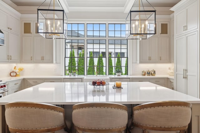 8118 Heirloom Blvd, College Grove, TN 37046 - kitchen with a chandelier, a sink, and light countertops
