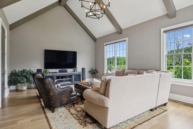 8118 Heirloom Blvd, College Grove, TN 37046 - living room with a chandelier, light wood-style flooring, and plenty of natural light