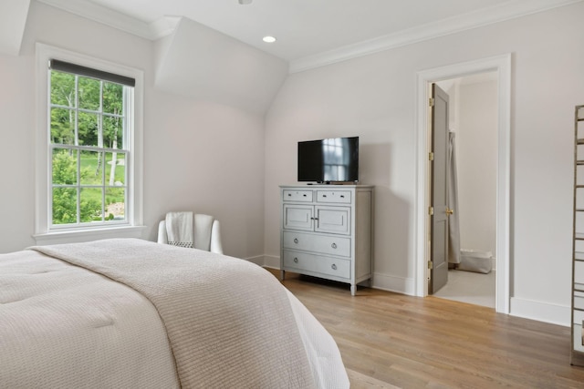 8118 Heirloom Blvd, College Grove, TN 37046 - bedroom with wood finished floors, ornamental molding, baseboards, recessed lighting, and connected bathroom