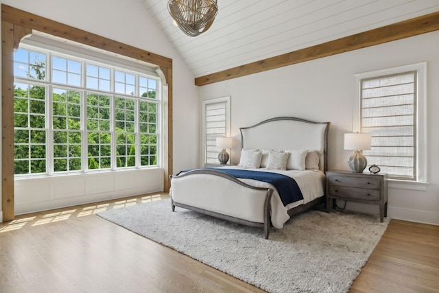 8118 Heirloom Blvd, College Grove, TN 37046 - bedroom featuring multiple windows, lofted ceiling, wood finished floors, and baseboards