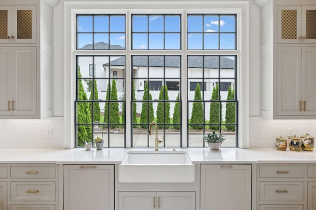 8118 Heirloom Blvd, College Grove, TN 37046 - kitchen with a sink, backsplash, and light countertops