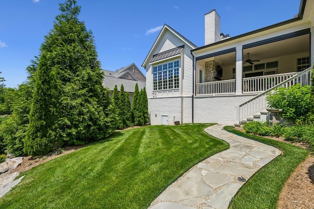 8118 Heirloom Blvd, College Grove, TN 37046 - view of grassy yard featuring a ceiling fan and stairway
