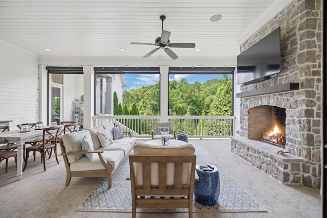 8118 Heirloom Blvd, College Grove, TN 37046 - living room with carpet, a ceiling fan, and an outdoor stone fireplace