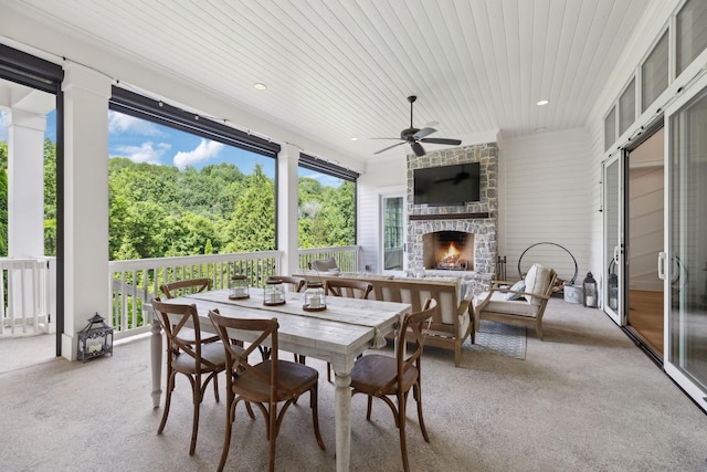 8118 Heirloom Blvd, College Grove, TN 37046 - view of patio / terrace featuring an outdoor stone fireplace, outdoor dining space, and ceiling fan