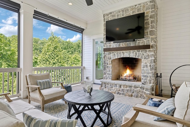 8118 Heirloom Blvd, College Grove, TN 37046 - sunroom / solarium featuring a ceiling fan and an outdoor living space with a fireplace