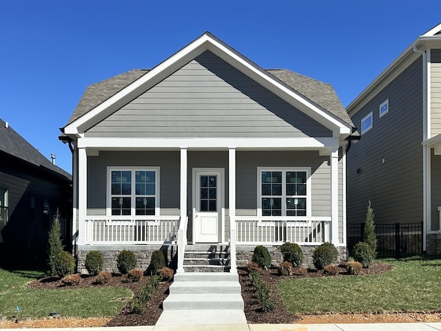 7133 Frances St, Fairview, TN 37062 - view of front of house featuring a porch and a shingled roof