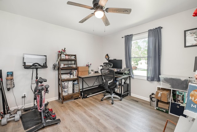 106 Aaron Dr, Burns, TN 37029 - office space with wood finished floors, ceiling fan, and baseboards