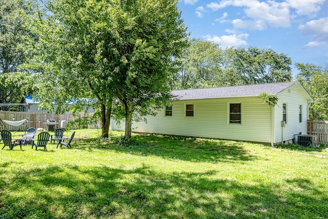 106 Aaron Dr, Burns, TN 37029 - view of yard featuring central AC