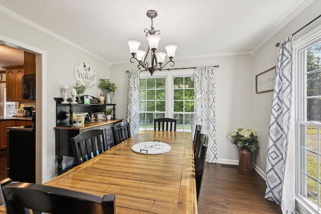 345 Big Spring Hollow Rd, Pulaski, TN 38478 - dining area featuring a chandelier, dark wood finished floors, crown molding, a textured ceiling, and baseboards