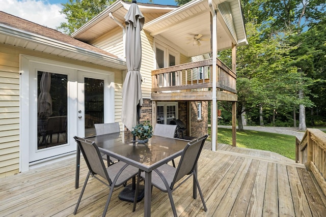 345 Big Spring Hollow Rd, Pulaski, TN 38478 - deck featuring outdoor dining area, french doors, a yard, and a ceiling fan
