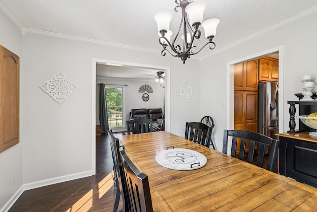 345 Big Spring Hollow Rd, Pulaski, TN 38478 - dining area with dark wood finished floors, crown molding, a chandelier, baseboards, and a textured ceiling