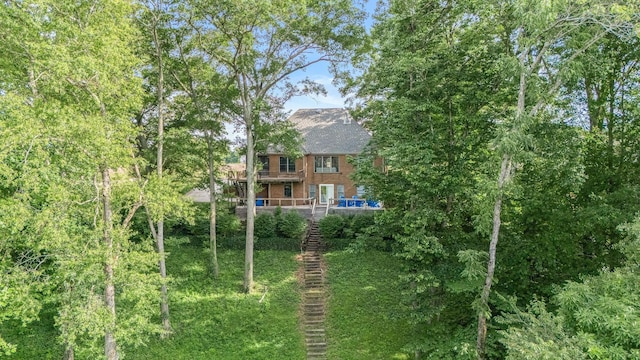 208 Loop Dr, Winchester, TN 37398 - back of house with brick siding, a deck, and stairway