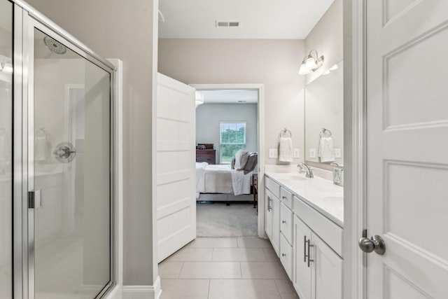 2037 Flowing Creek Dr, Franklin, TN 37064 - ensuite bathroom with double vanity, a shower stall, and tile patterned flooring