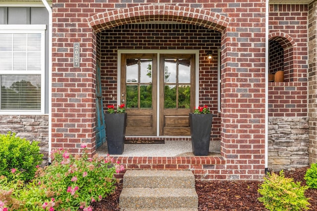 2037 Flowing Creek Dr, Franklin, TN 37064 - doorway to property with french doors and brick siding