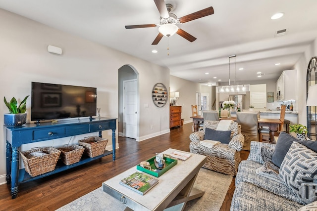 2037 Flowing Creek Dr, Franklin, TN 37064 - living area with ceiling fan, arched walkways, wood finished floors, baseboards, and recessed lighting