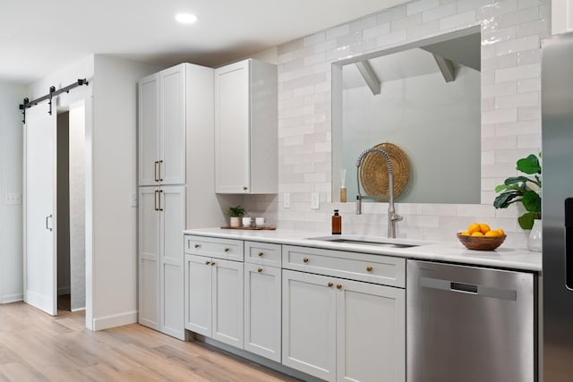4900 Chesterfield Dr, Murfreesboro, TN 37127 - kitchen featuring dishwasher, tasteful backsplash, a sink, light countertops, and recessed lighting