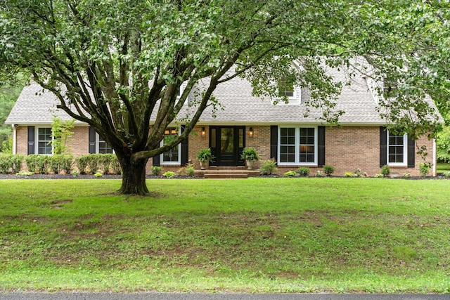 4900 Chesterfield Dr, Murfreesboro, TN 37127 - view of front of property with brick siding, a front lawn, and roof with shingles