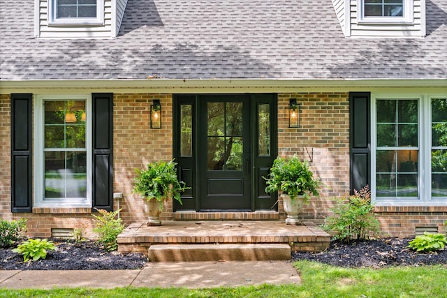 4900 Chesterfield Dr, Murfreesboro, TN 37127 - view of exterior entry featuring brick siding, roof with shingles, and a porch