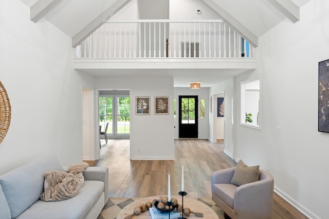 4900 Chesterfield Dr, Murfreesboro, TN 37127 - living area featuring high vaulted ceiling, beamed ceiling, wood finished floors, and baseboards