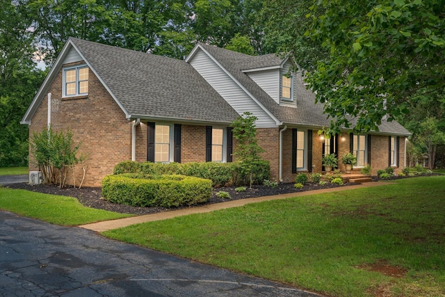 4900 Chesterfield Dr, Murfreesboro, TN 37127 - view of front of house featuring brick siding, a front lawn, and roof with shingles
