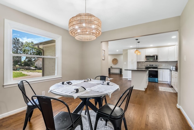 209 Franklin Park, Winchester, TN 37398 - dining space with dark wood-style floors, a chandelier, and recessed lighting