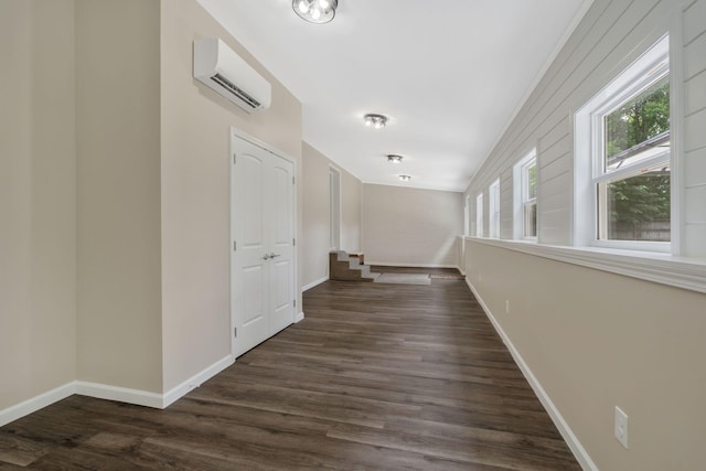 209 Franklin Park, Winchester, TN 37398 - corridor with an AC wall unit and dark wood-style floors