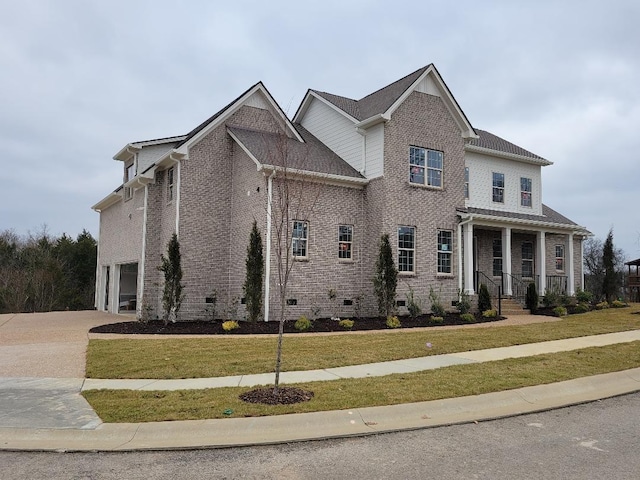 1493 Eden Rose Pl, Nolensville, TN 37135 - view of front facade featuring crawl space, a garage, a front lawn, brick siding, and driveway
