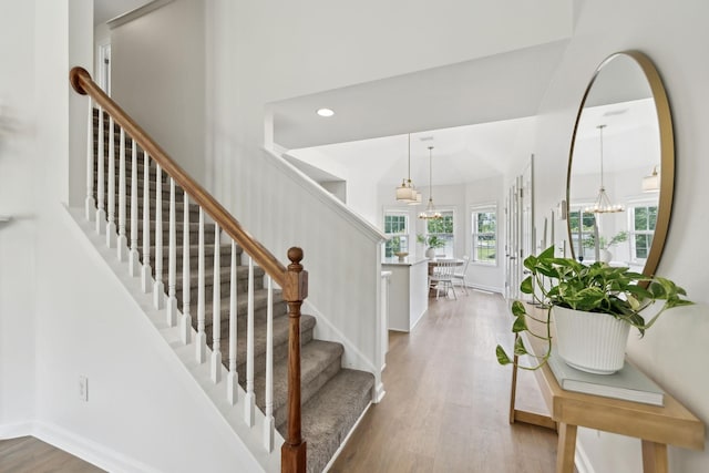 3065 Sakari Cir, Spring Hill, TN 37174 - staircase featuring a chandelier, wood finished floors, recessed lighting, and baseboards