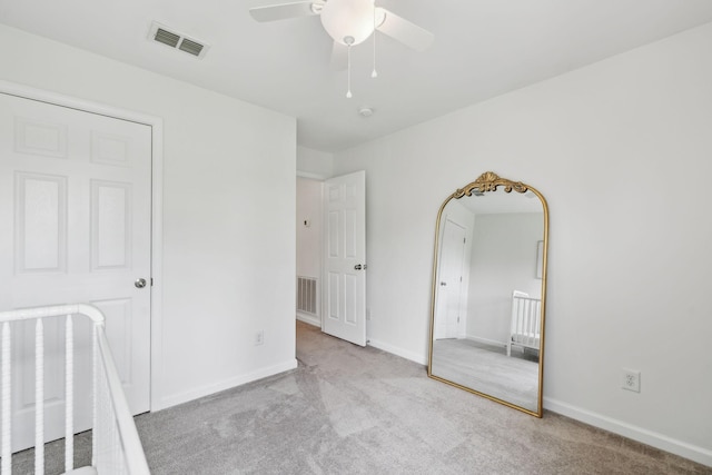 3065 Sakari Cir, Spring Hill, TN 37174 - unfurnished bedroom with carpet flooring, baseboards, and a ceiling fan