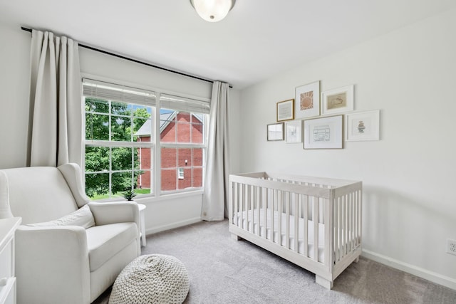 3065 Sakari Cir, Spring Hill, TN 37174 - carpeted bedroom with baseboards and a crib
