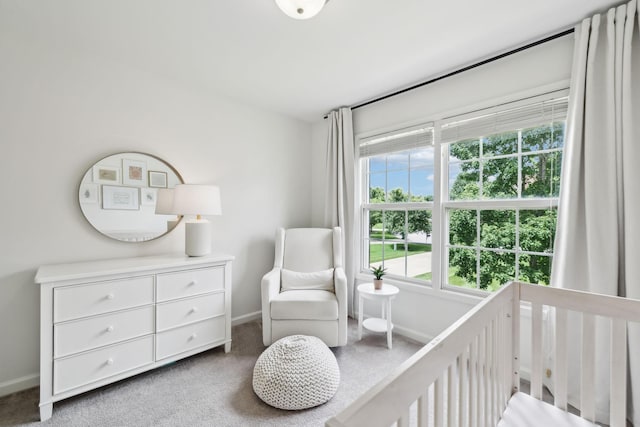 3065 Sakari Cir, Spring Hill, TN 37174 - carpeted bedroom featuring baseboards and a crib