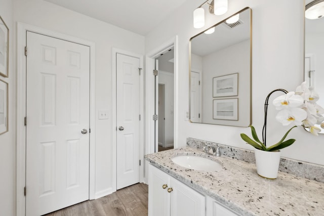 3065 Sakari Cir, Spring Hill, TN 37174 - bathroom with vanity and wood finished floors