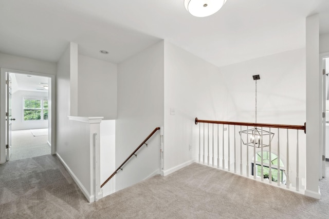3065 Sakari Cir, Spring Hill, TN 37174 - corridor with an upstairs landing, carpet, a chandelier, and baseboards