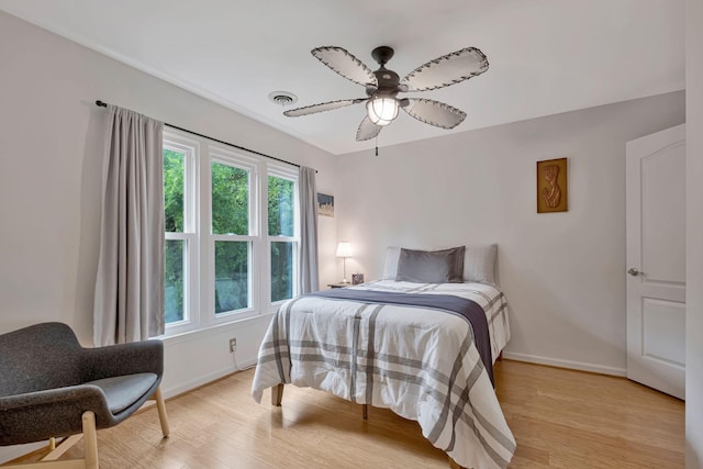 317 Ketch Cv, Hermitage, TN 37076 - bedroom featuring light wood finished floors, baseboards, and ceiling fan