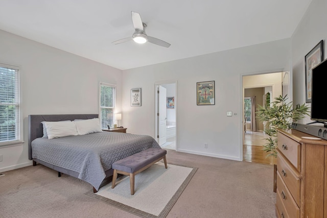 317 Ketch Cv, Hermitage, TN 37076 - bedroom with light colored carpet, multiple windows, baseboards, and ceiling fan