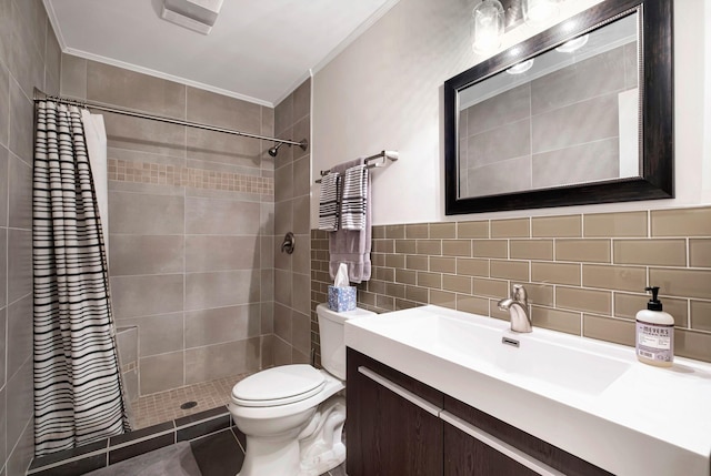 317 Ketch Cv, Hermitage, TN 37076 - full bathroom featuring tile walls, a tile shower, toilet, vanity, and ornamental molding