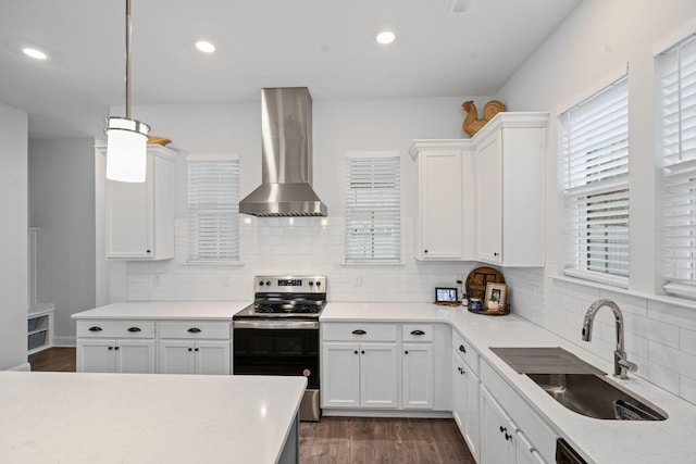 1308 Belgove Aly, Antioch, TN 37013 - kitchen featuring range hood, stainless steel range with electric stovetop, a sink, dark wood-style floors, and light countertops