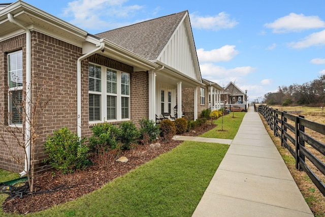 1308 Belgove Aly, Antioch, TN 37013 - view of home's exterior with brick siding and a shingled roof