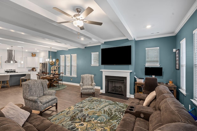 1308 Belgove Aly, Antioch, TN 37013 - living area with beamed ceiling, a fireplace with flush hearth, wood finished floors, a ceiling fan, and baseboards