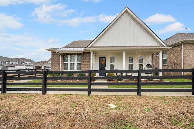 1308 Belgove Aly, Antioch, TN 37013 - view of front of property featuring brick siding, board and batten siding, and covered porch