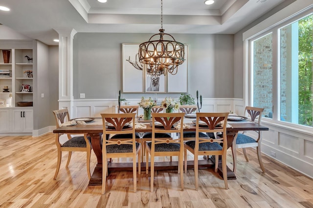 2670 Morgan Rd, Joelton, TN 37080 - dining area featuring a decorative wall, light wood-type flooring, a raised ceiling, recessed lighting, and wainscoting