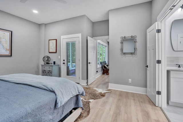2670 Morgan Rd, Joelton, TN 37080 - bedroom with access to outside, light wood finished floors, baseboards, and recessed lighting